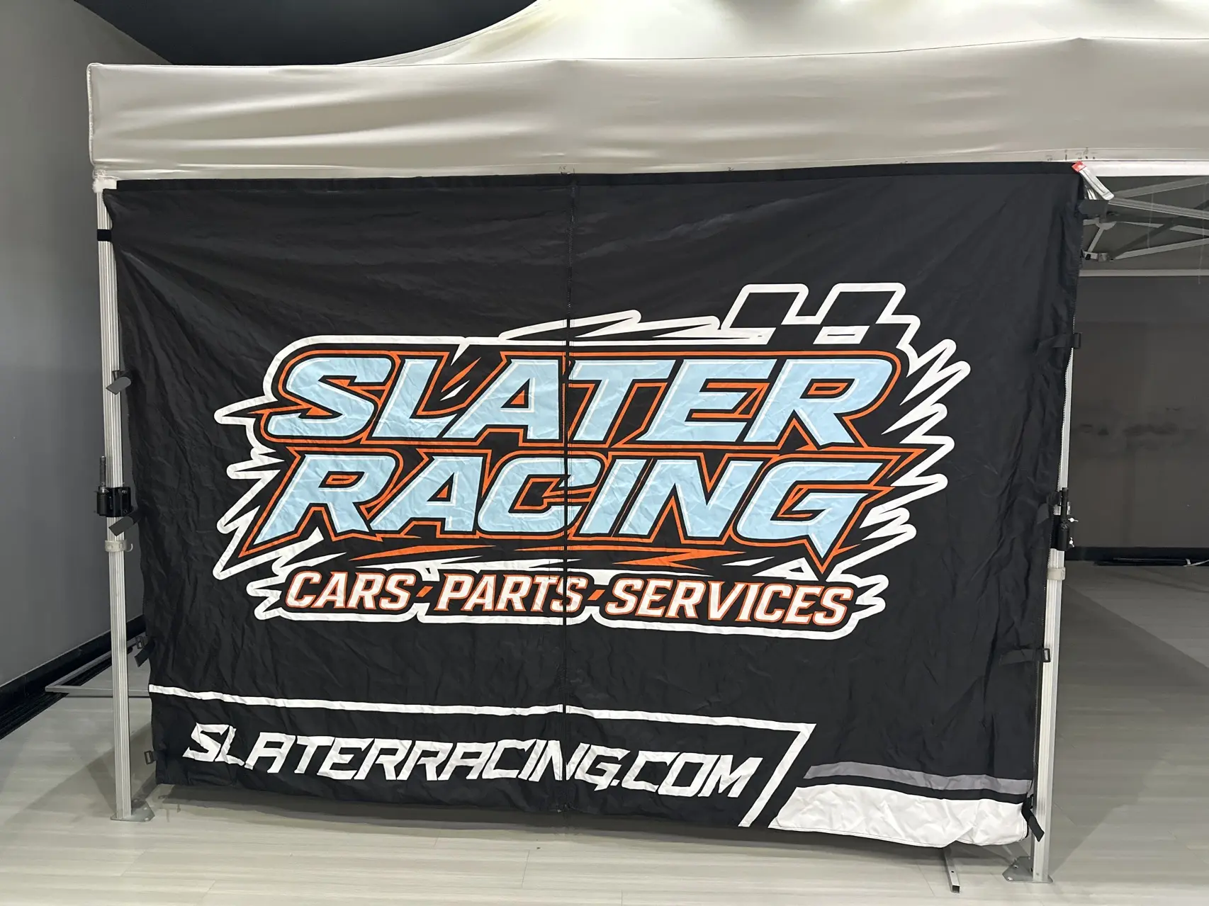 Shop custom canopy walls, flags and trackside products